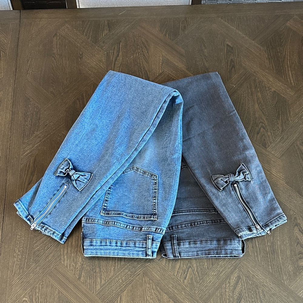 2 pair stretch denim jeans with bow and zipper ankle detail size L brand new